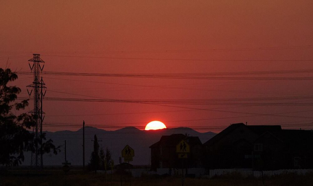 Electricity pylons at sunset