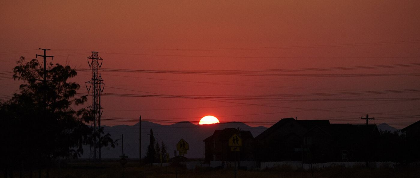 Electricity pylons at sunset